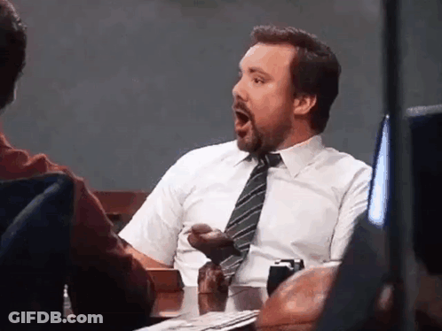 Man In White Shirt And Tie Sitting GIF