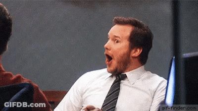 Man In White Shirt And Tie Sitting With Mouth Open GIF