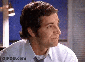 Man In White Shirt And Tie Smiling GIF
