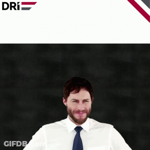 Man In White Shirt And Tie Surrounded By Calculator And Tablet GIF