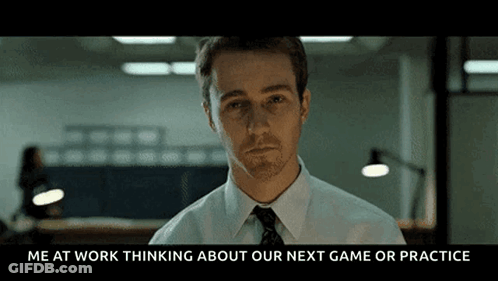 Man In White Shirt And Tie Thinking About Next Game GIF