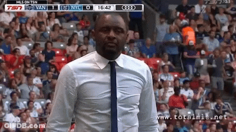 Man In White Shirt And Tie Watching Game On TSN GIF