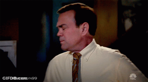 Man In White Shirt And Tie With NBC Logo GIF
