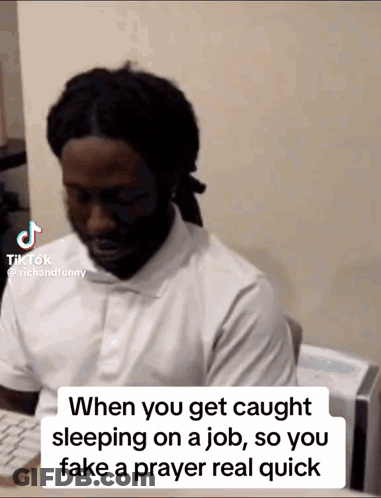 Man In White Shirt At Desk GIF