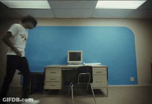 Man In White Shirt At Desk With Computer GIF