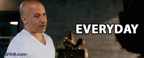 Man In White Shirt At Everyday Sign GIF