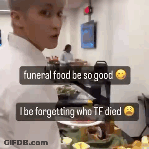 Man In White Shirt At Table With Plate Of Food GIF