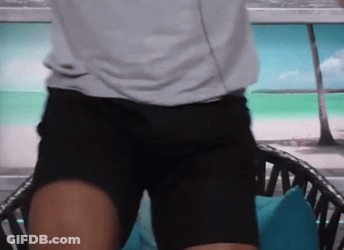 Man In White Shirt Black Shorts Before Chair GIF