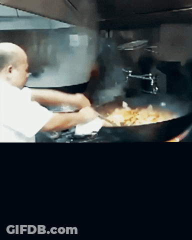 Man In White Shirt Cooking Food GIF
