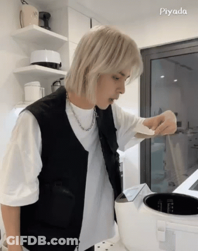 Man In White Shirt Cooking Rice GIF