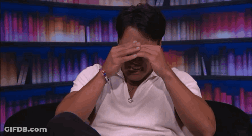 Man In White Shirt Covering Eyes GIF