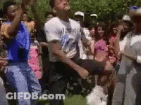 Man In White Shirt Dancing Before Crowd GIF