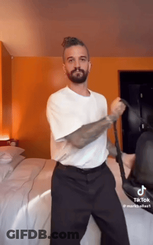 Man In White Shirt Dancing In Bedroom GIF