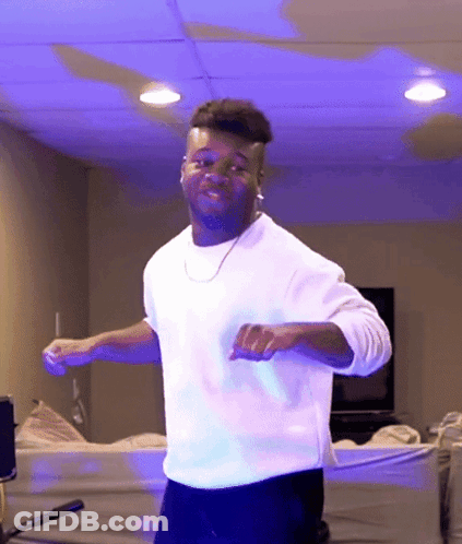 Man In White Shirt Dancing In Blue Light GIF