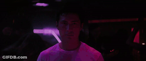 Man In White Shirt Dancing In Crowd GIF