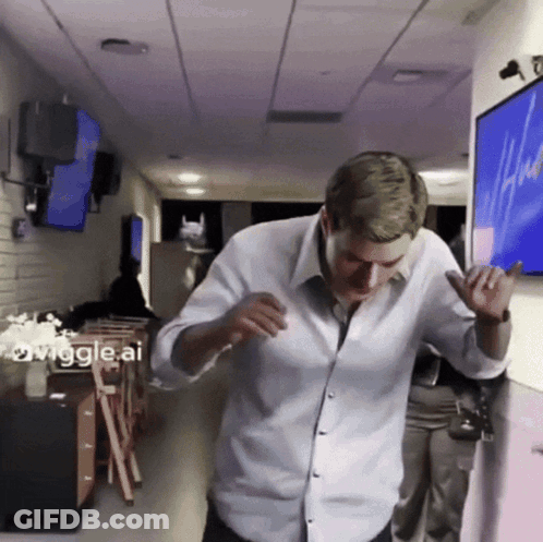 Man In White Shirt Dancing In Hallway Wiggle AI GIF
