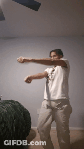 Man In White Shirt Dancing GIF