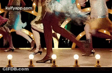 Man In White Shirt Dancing With Hand In Air GIF