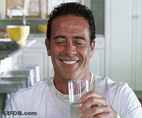 Man In White Shirt Drinking Water Smiling GIF