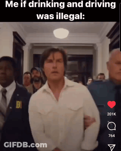 Man In White Shirt Escorted By Police Officer In Hallway GIF