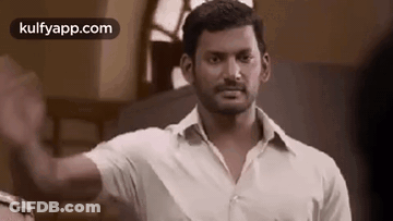 Man In White Shirt Giving High Five GIF
