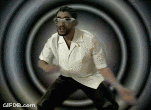 Man In White Shirt Glasses Dancing Dark Room GIF