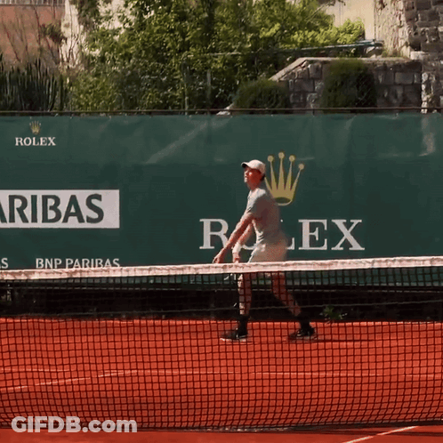 Man In White Shirt Helped By Another Man GIF