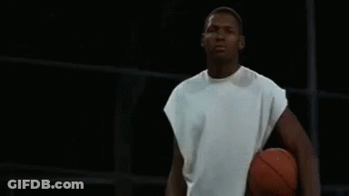 Man In White Shirt Holding Basketball GIF