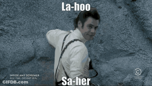 Man In White Shirt Holding Camera GIF