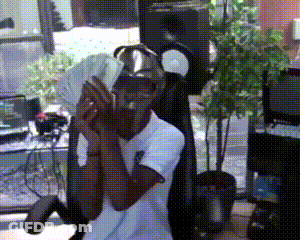 Man In White Shirt Holding Money GIF