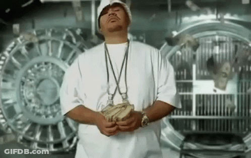 Man In White Shirt Holding Money GIF