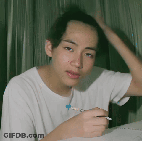 Man In White Shirt Holding Pen GIF