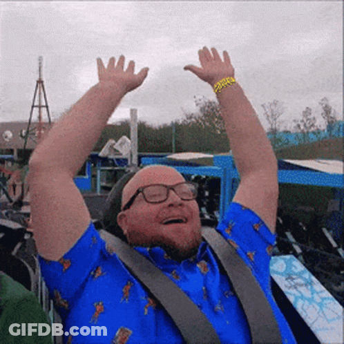 Man In White Shirt Holding Sword In Forest GIF