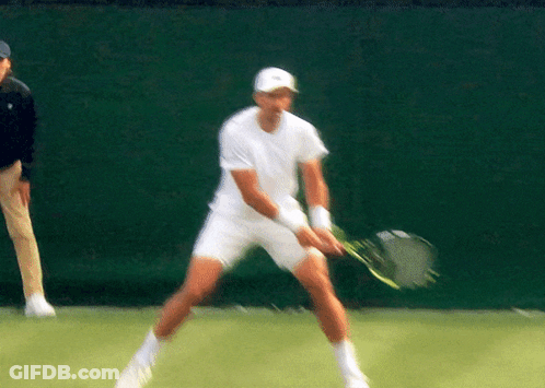 Man In White Shirt Holding Tennis Racket GIF