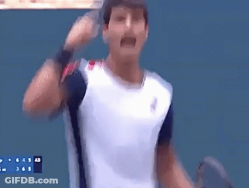 Man In White Shirt Holding Tennis Racquet GIF