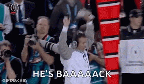 Man In White Shirt Holding Trophy Says Baaaack GIF