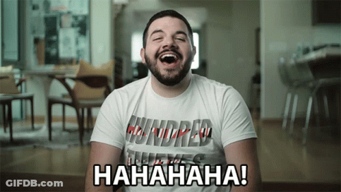 Man In White Shirt Hundred Laughs GIF