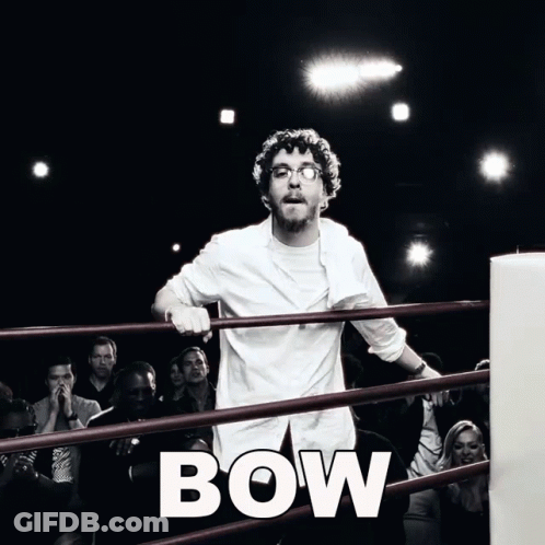 Man In White Shirt In Boxing Ring Saying Bow GIF