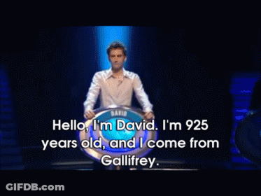 Man In White Shirt In Front Of David Sign GIF