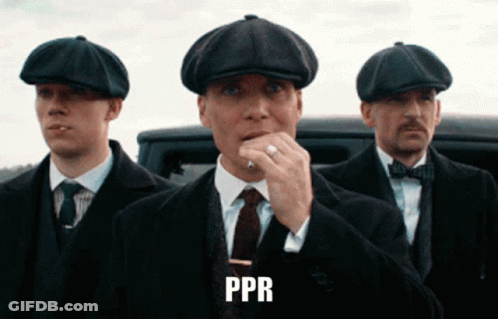 Man In White Shirt In Front Of Jack Ryan Wall GIF