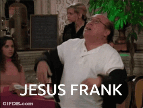 Man In White Shirt In Front Of Jesus Frank Sign GIF