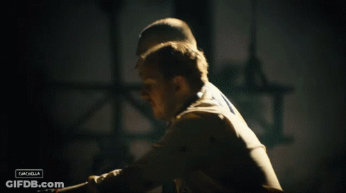 Man In White Shirt In Front Of Pepsi Sign GIF