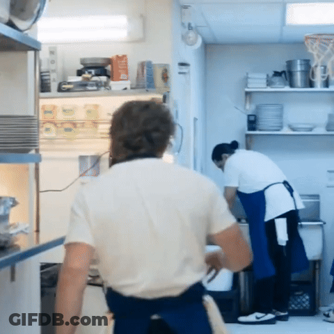 Man In White Shirt In Front Of Refrigerator GIF