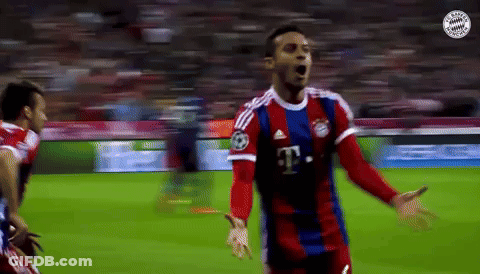 Man In White Shirt In Front Of Scoreboard Saying K 2-0 Kza GIF