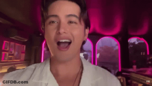 Man In White Shirt In Pink Room GIF