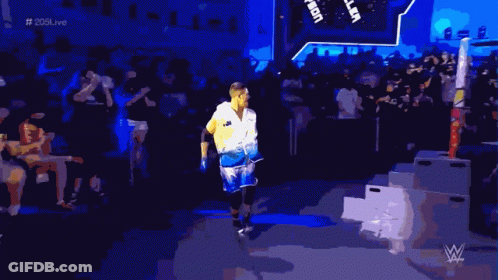 Man In White Shirt Johnson Enters Wrestling Ring GIF