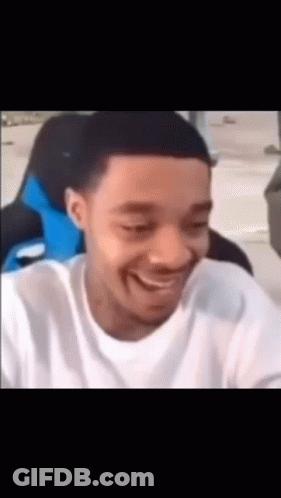 Man In White Shirt Laughing At Camera GIF
