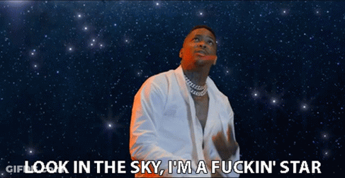 Man In White Shirt Looking Up And Saying Im A Star GIF