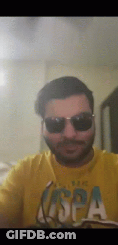 Man In White Shirt Looking Up At Sky GIF