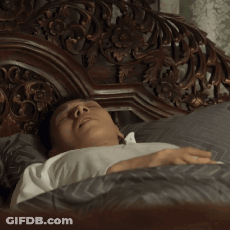 Man In White Shirt Lying In Bed GIF